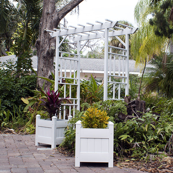 Our Pristine White Geometric Flat Top Vinyl Arbor stands a stately 85” tall and will certainly create a welcoming entry to anywhere in your garden. The detailed geometric design and flat top of this unit adds a clean pristine contemporary look to any setting. Beautiful side panels and the top enhances the softer, natural angles of your garden