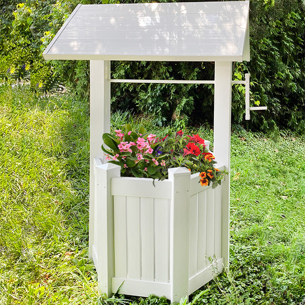 ALT TEXT:  Our Pristine White Vinyl Wishing Well Garden Structure is made in the USA and will add a decorative and pristine bright white to your garden. You can use it to cover up an unsightly section of your garden or hole and make a breathtaking statement at the same time.  . The sturdy, white vinyl construction contains the highest concentration of titanium dioxide available, stabilizing and protecting the material from ultraviolet rays, cracking, yellowing, warping, or peeling.