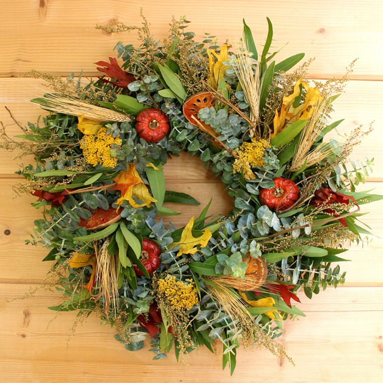 This vibrant wreath will add a splash of color and fragrance into your home and welcome guests from the beginning of the fall season and continue to provide its splendor into and beyond your upcoming Thanksgiving celebration.