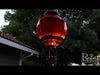 Video of our breathtakingly beautiful Red, White and Blue Stripe Solar LED Powered Hot Air Balloon Lantern features hand-painted glass panels of red, white and blue, plus a string of flicker-happy LED lights, this lantern looks like a real hot air balloon. Hang it up and watch it glow for 6-8 hours with the included replaceable rechargeable batteries. Size is 7.5'' x 7.5'' x 23.5'' tall.